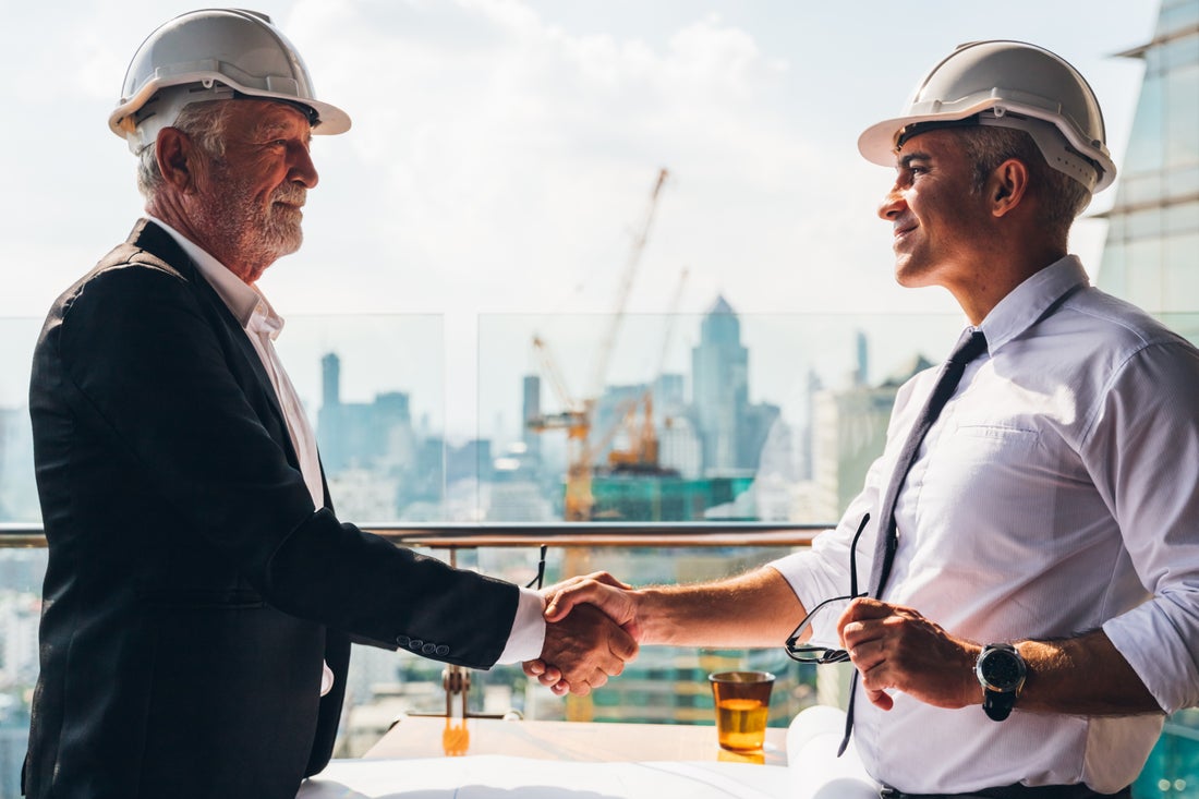 a man holding a wine glass